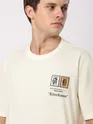 Cream Stamps Printed Oversized T-Shirt